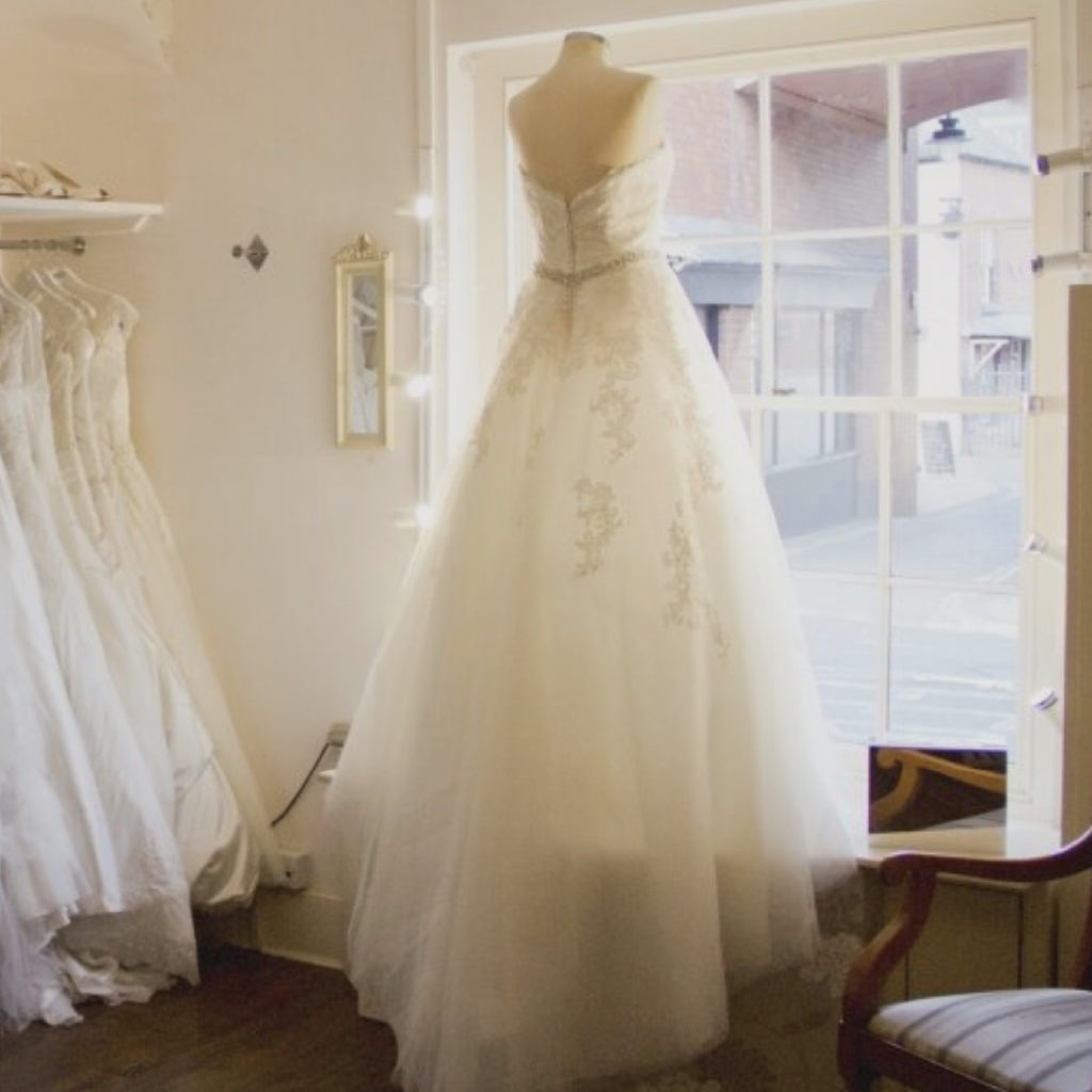 Wedding Dress with Long Flowing Netting Bottom in Shop Window