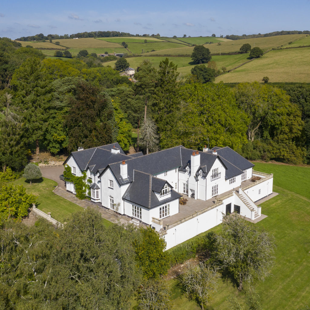 Aerial View of Woodbank House and Surrounding Welsh Landscape