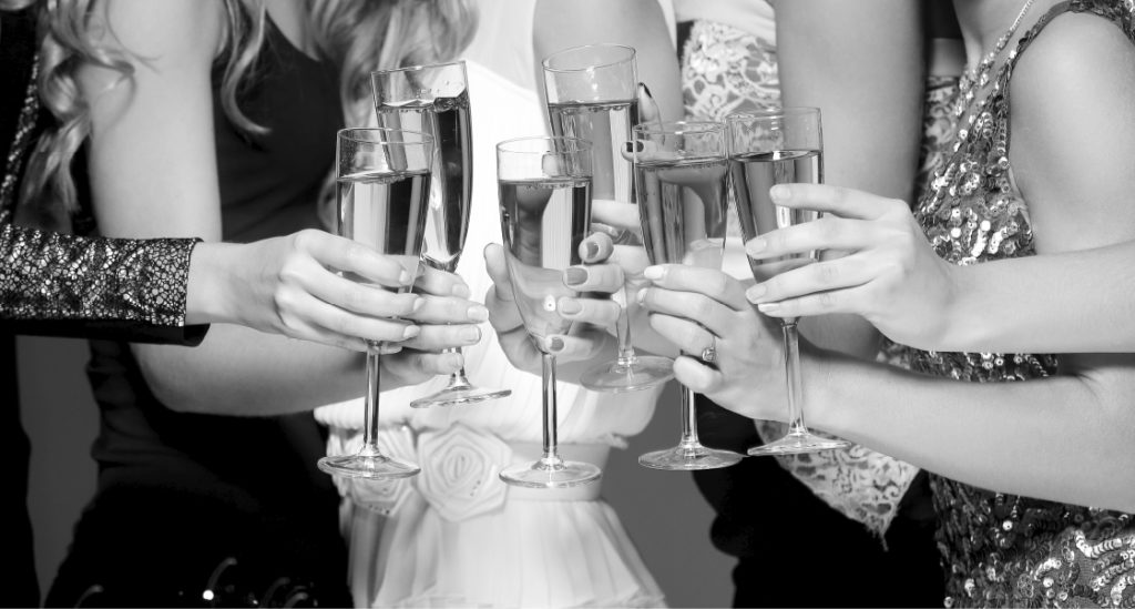 People Celebrating with Glasses of Champagne Close Up